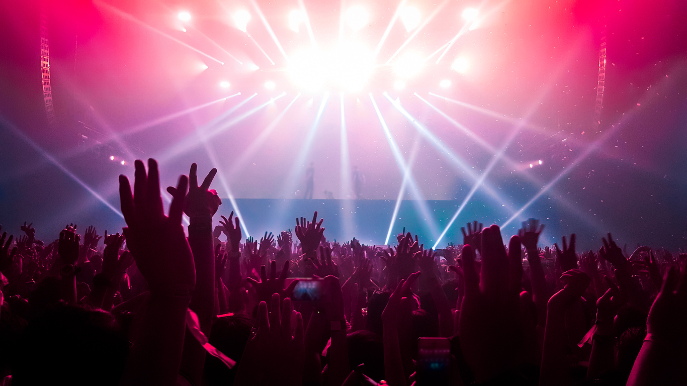 People dancing in a nightclub or concert