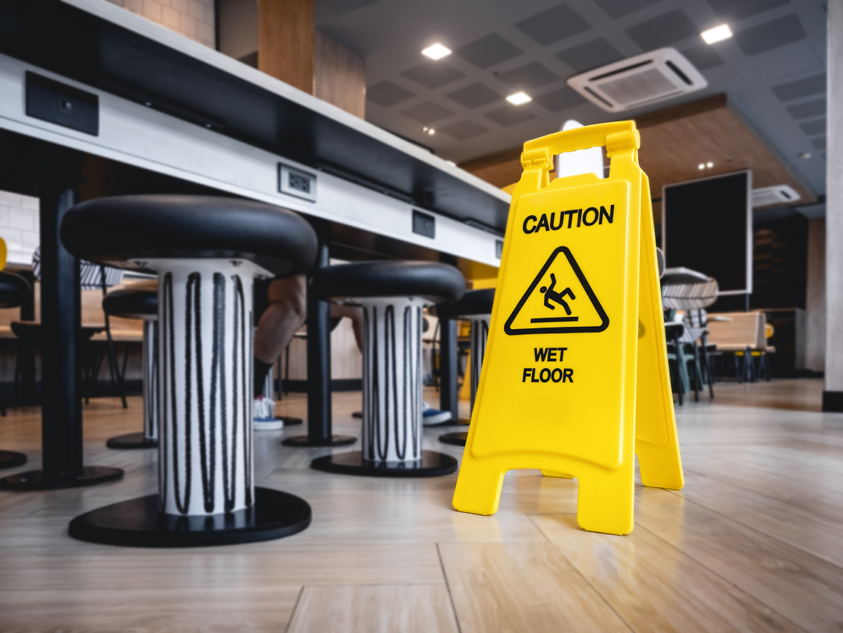 Caution Wet floor signage stand indoor Building